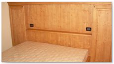 Arredamento in legno: camera rustica